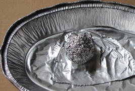 map of the solar system in used tinfoil